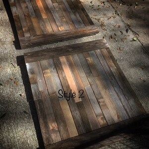May include: Two rectangular wooden panels with a rustic, weathered appearance. The panels are constructed from various shades of brown, gray, and orange wood planks. The text "Style 2" is written on one of the panels.