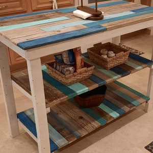 Coastal style kitchen island extra counter space storage wine rack liquor shelf shelving in beach house blues with or without casters