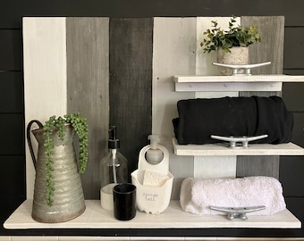 Monochromatic shelving unit storage towel rack in shades of gray black and white