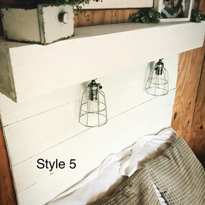 May include: White wooden headboard with two metal cage pendant lights. The headboard has a rustic, farmhouse style. The text "Style 5" is visible on the headboard.