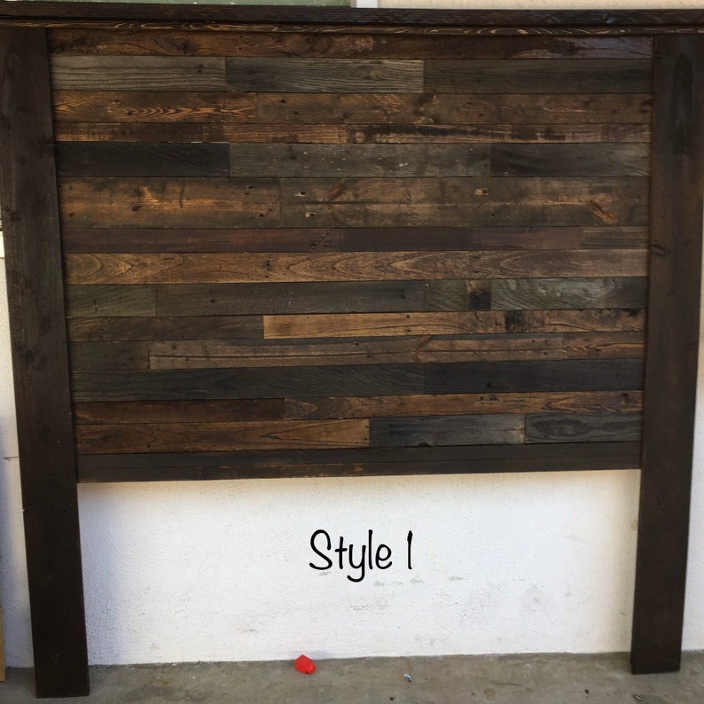 May include: A rustic headboard made from reclaimed wood. The headboard features a patchwork design of various wood tones, including browns, grays, and blacks. The frame is a dark brown. The text "Style 1" is written in black script.