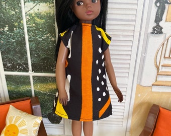 Mini-jurk met Afrikaanse print voor Sindy en vrienden. (Oranje streep.)