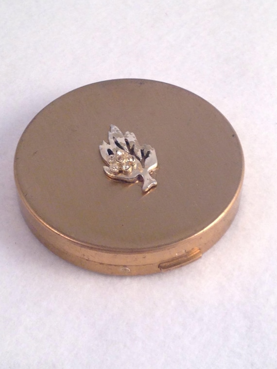 Vintage 1950s Volupte compact 1950s goldtone rhine