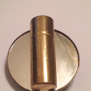 1950's make-upspiegel lippenstiftetui parelstrass ijdelheid