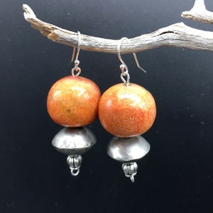 Ethnic earrings with vintage sponge coral and vintage African silver beads with Tibetan silver accents