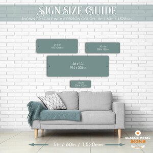 a couch against a white brick wall, with a sign size guide displayed above it. The guide provides measurements for different sign sizes, including 5ft / 60in / 1,520mm, and 12' x 4' / 300in x 105mm.