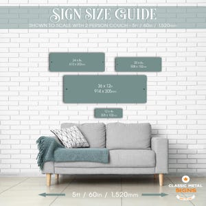 a couch against a white brick wall, with a sign size guide displayed above it. The guide provides measurements for different sign sizes, including 5ft / 60in / 1,520mm, and 12' x 4' / 300in x 105mm.