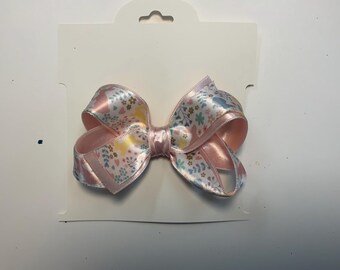Easter Bunny Boutique Hairbow-Approximately 4” long 2” wide using 7/8” BunnySatin top layer and pink blush satin bottom layer