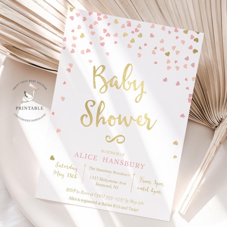 May include: A pink and gold baby shower invitation with a confetti design. The invitation reads "Baby Shower" in gold script and includes the details for Alice Hansbury's baby shower. The shower will be held on Saturday, May 18th from 3pm to 4pm at The Hansbury Residence, 1337 Holystone Ave, Jesmond, NJ. RSVP to Kerri at (321) 555-1337 by May 4th. Alice is registered at Babies R Us and Target.