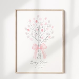 May include: A watercolour print of a pink and grey fingerprint tree with a pink bow. The text "Baby Olivia Showered with Love 2nd April 2025" is below the tree.