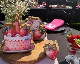 Wooden set of 10 Berry First Birthday Strawberry Centerpieces featuring adorable characters like a bunny elephant and white teddy bear