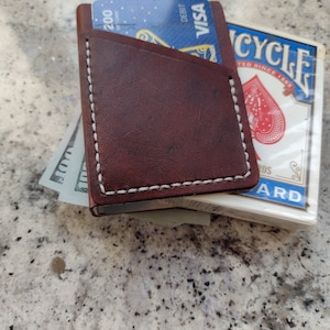 Cartera de cuero con clip para naipes