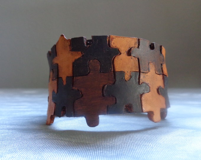 Leather Cuff by Artrix Leather and Fine art -Puzzle Cuff