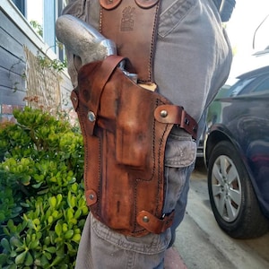 Custom molded leather drop leg tactical style holster made to order