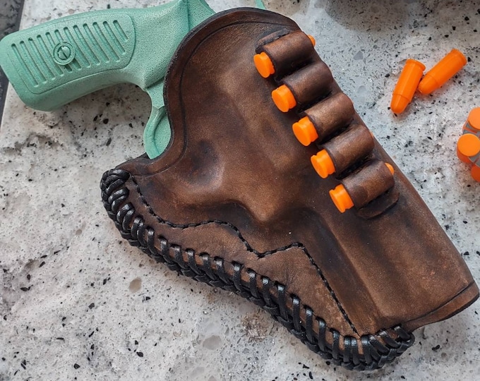 Custom molded leather holster with extra cartridge loops made to order