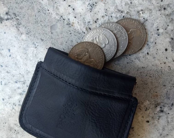 Leather coin purse with squeeze frame