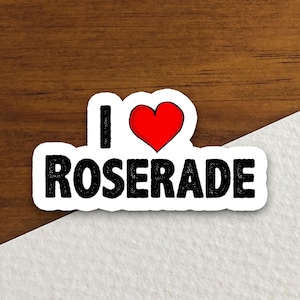 May include: A white sticker with a red heart and the text "I love Roserade" in black.