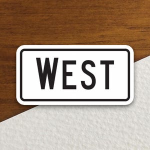 Sticker verkeersbord richting westen, sticker verkeersbord, decoratie verkeersbord, verkeersborden, verkeersbord, sticker westen