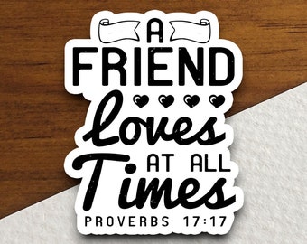 May include: A black and white sticker with the text "A friend loves at all times Proverbs 17:17".
