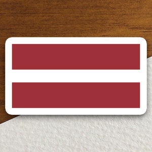 Puede incluir: Una pegatina con dos rayas horizontales rojas sobre un fondo blanco.