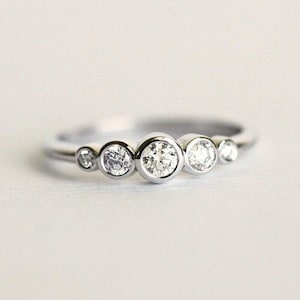 Bezel Set Diamond Engagement Ring: White Gold Five Stone Band