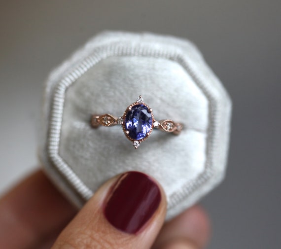 8.60 Carat Pear-Cut Tanzanite and Diamond Halo Ring