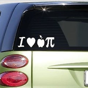 May include: White vinyl decal sticker with the text "I love pi" with a heart and an apple graphic. The sticker is on the back window of a green car.