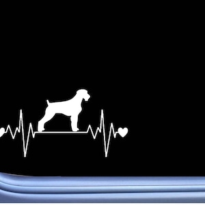 May include: A white silhouette of a Wirehaired Pointing Griffon dog with a heartbeat line and two hearts on either side of the dog.