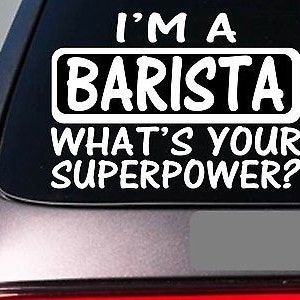 May include: White vinyl sticker with black text that reads "I'm a Barista What's Your Superpower?" The word "Barista" is in a black rectangle.