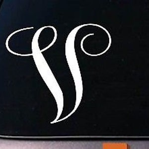 May include: White vinyl decal of a stylized letter V with a decorative flourish. The decal is on a black background.