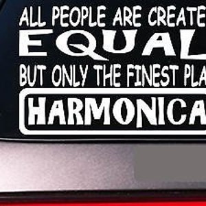May include: White vinyl sticker with the text "All people are created equal but only the finest play harmonica".