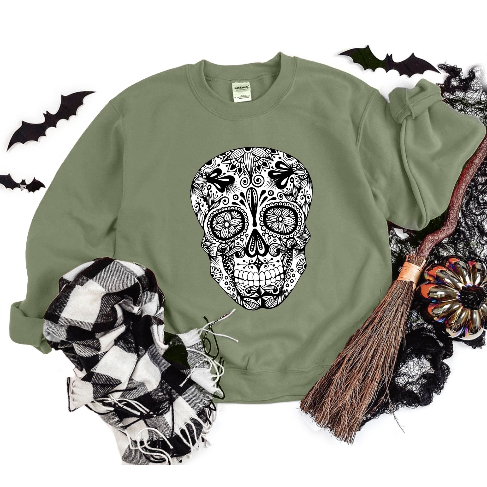 Green skull sweater sale