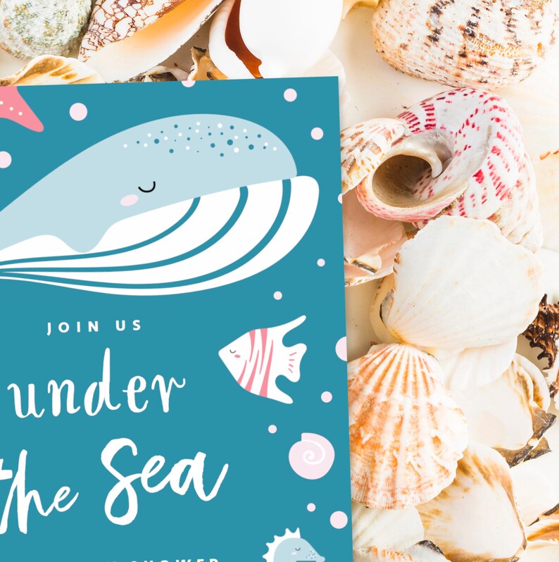 May include: A blue invitation card with a cartoon whale and the text "Join us under the sea". The card is surrounded by seashells.