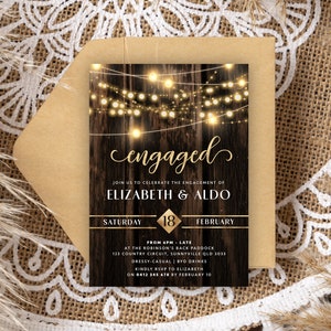 May include: Rustic wood background with string lights, a gold border, and the text "engaged" in gold script. The text "Join us to celebrate the engagement of Elizabeth & Aldo" is below the script. The date is "Saturday, 18 February" and the time is "From 5pm - Late". The location is "At the Robinson's Back Paddock, 123 Country Circuit, Sunnyville QLD 3033". The dress code is "Dressy-Casual, BYO Drinks". The RSVP information is "Kindly RSVP to Elizabeth on 0412 345 478 by February 10".