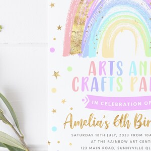 May include: A colorful rainbow with gold glitter and stars on a white background. The text "ARTS AND CRAFTS PARTY" is written in rainbow colors. The text "IN CELEBRATION OF" is written in purple. The text "Amelia's 6th Birthday" is written in gold. The text "SATURDAY 18TH JULY, 2023 FROM 10AM-12:30PM" is written in black. The text "AT THE RAINBOW ART CENTRE" is written in black. The text "123 MAIN ROAD, SUNNYVILLE QLD 3033" is written in black.