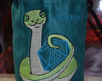 May include: A teal green dice bag with a green snake embroidered on it. The snake is holding a blue 20-sided die. The bag has a drawstring closure and the text "...wooop!" is embroidered on the bag.
