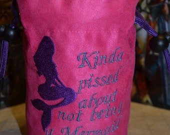 May include: Pink velvet dice bag with a purple mermaid silhouette and the text "Kinda pissed about not being a mermaid".