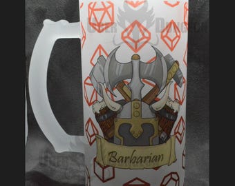 May include: White frosted glass beer stein with a red and white design. The design features a barbarian helmet with axes and a banner that reads "Barbarian".