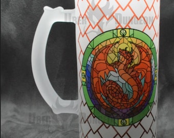 May include: White frosted glass beer stein with a red dragon in a stained glass design. The dragon is surrounded by a green, blue, and yellow circle. The stein has a white handle and a red and white checkered pattern on the back.