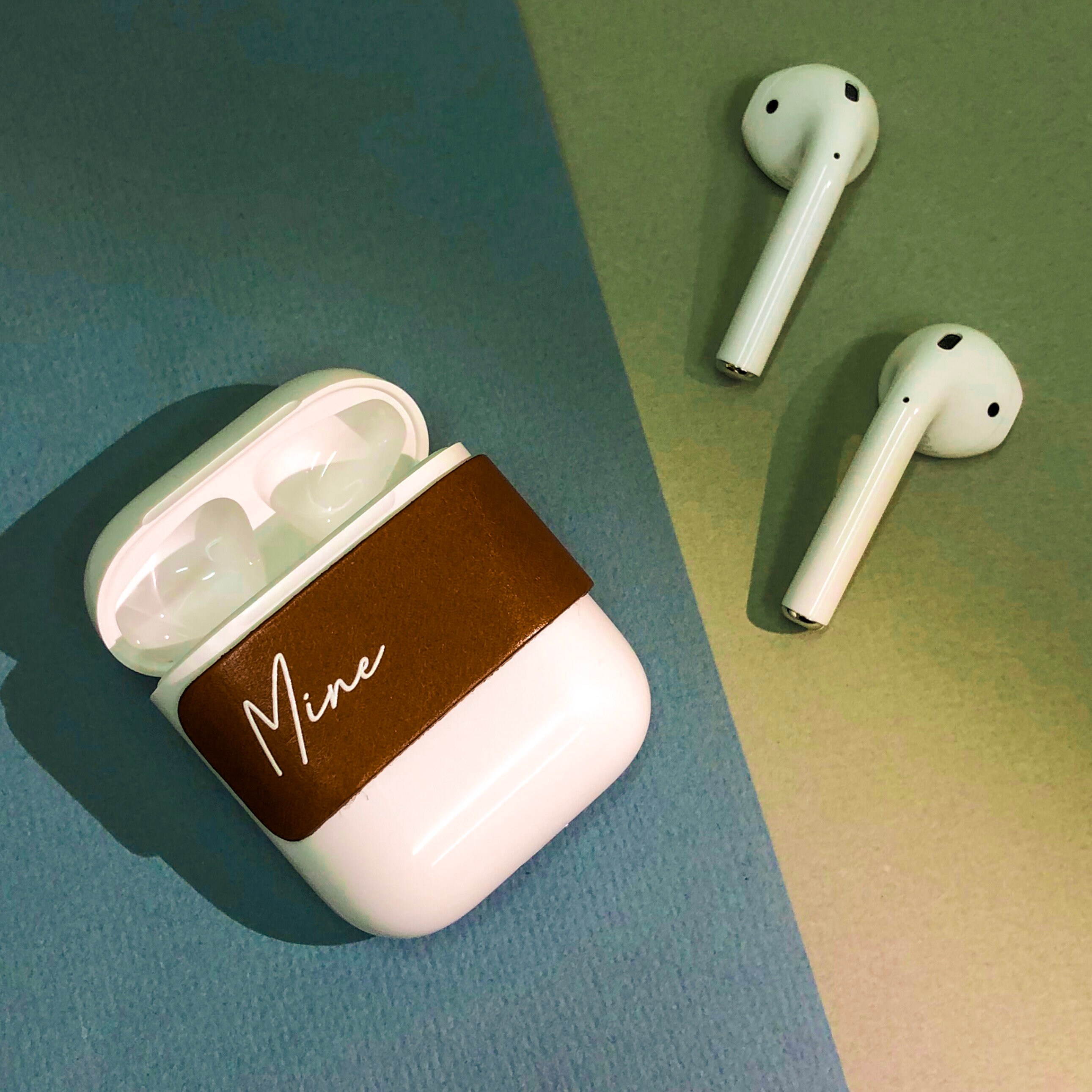Mambi Stickers on my Apple AirPods