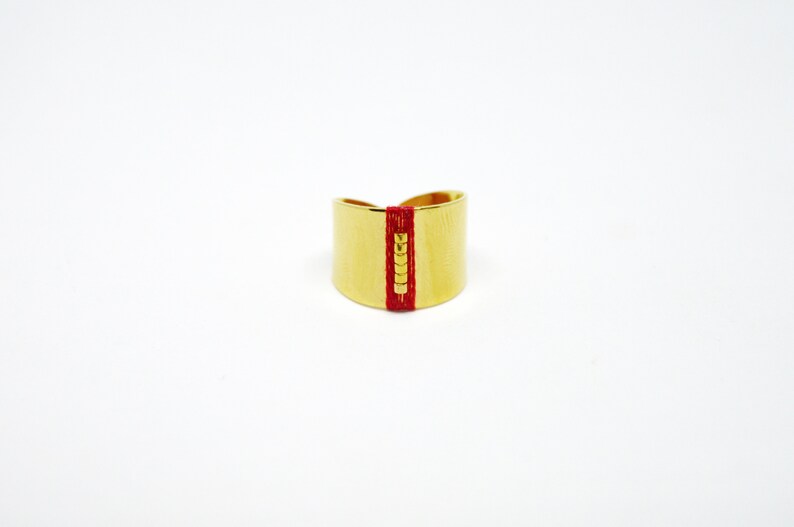Bague tiss\u00e9e INCA rouge dor\u00e9e \u00e0 l/'or fin
