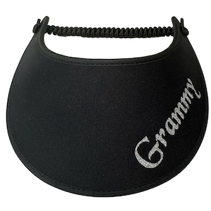 May include: Black visor with the word "Grammy" in silver glitter script. The visor has a curved brim and a black elastic band for a secure fit. A stylish accessory for sun protection.