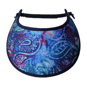 May include: A blue and red paisley patterned visor with a navy blue brim and adjustable strap.