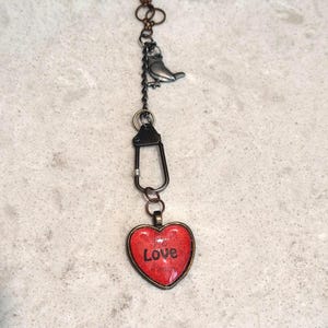 Steampunk Heart Necklace: Mixed Metal Heart Pendants with printed 'Love'
