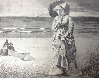 May include: A woman in a long dress and a wide-brimmed hat stands on a beach. She is holding a parasol. Two people are in a rowboat in the background.