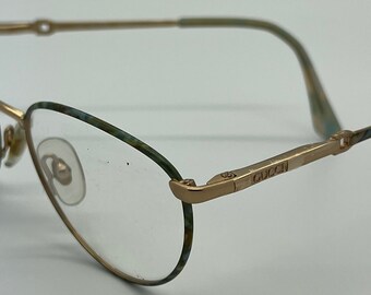 gold gucci glasses frames