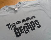 The Beatles Haircut Printed T-shirt Top. Rare Mod 60s John Lennon Vintage Tour Style Records LP Vinyl George Harrison Ringo