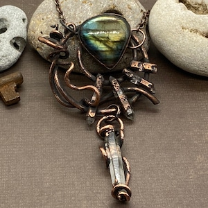 Copper Electroformed Labradorite with natural Quartz points and Grapevines... w/ a 20” antiqued Copper chain.