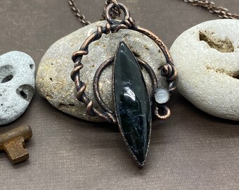 Copper Electroformed Olivine Magnetite and Moonstone with natural Grapevine... w/ a 20” antiqued Copper chain.