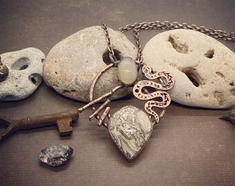 Copper Electroformed Crazy Lace Agate and Moonstone with a Snake charm... w/ a 20” antiqued Copper chain.